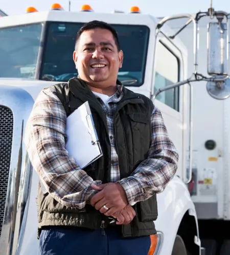 Man smiling with truck